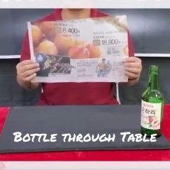 Bottle Through Table